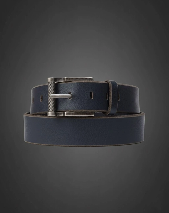 Excellence is never accidental. This belt is crafted for those who demand the finest materials and meticulous attention to detail. Every step of its creation reflects a commitment to quality and craftsmanship that sets it apart from ordinary belts. Made from 9 to 10 ounce premium Tuscany full grain leather, this belt is incredibly soft and supple, offering a luxurious feel that stands out in both comfort and style. Designed for leather enthusiasts, it delivers a rich texture and a refined appearance that grows more beautiful with time. Constructed from a single solid piece of leather, it contains no bonded or layered materials. This ensures minimal stretching and prevents cracking or damage around the holes, providing durability that lasts for decades. Each belt is carefully handcrafted from the highest quality hide, creating a timeless accessory that can be passed down through generations. The Pinnacle belt embodies the ultimate in premium leather craftsmanship, combining elegance, strength, and enduring style in one exceptional piece.